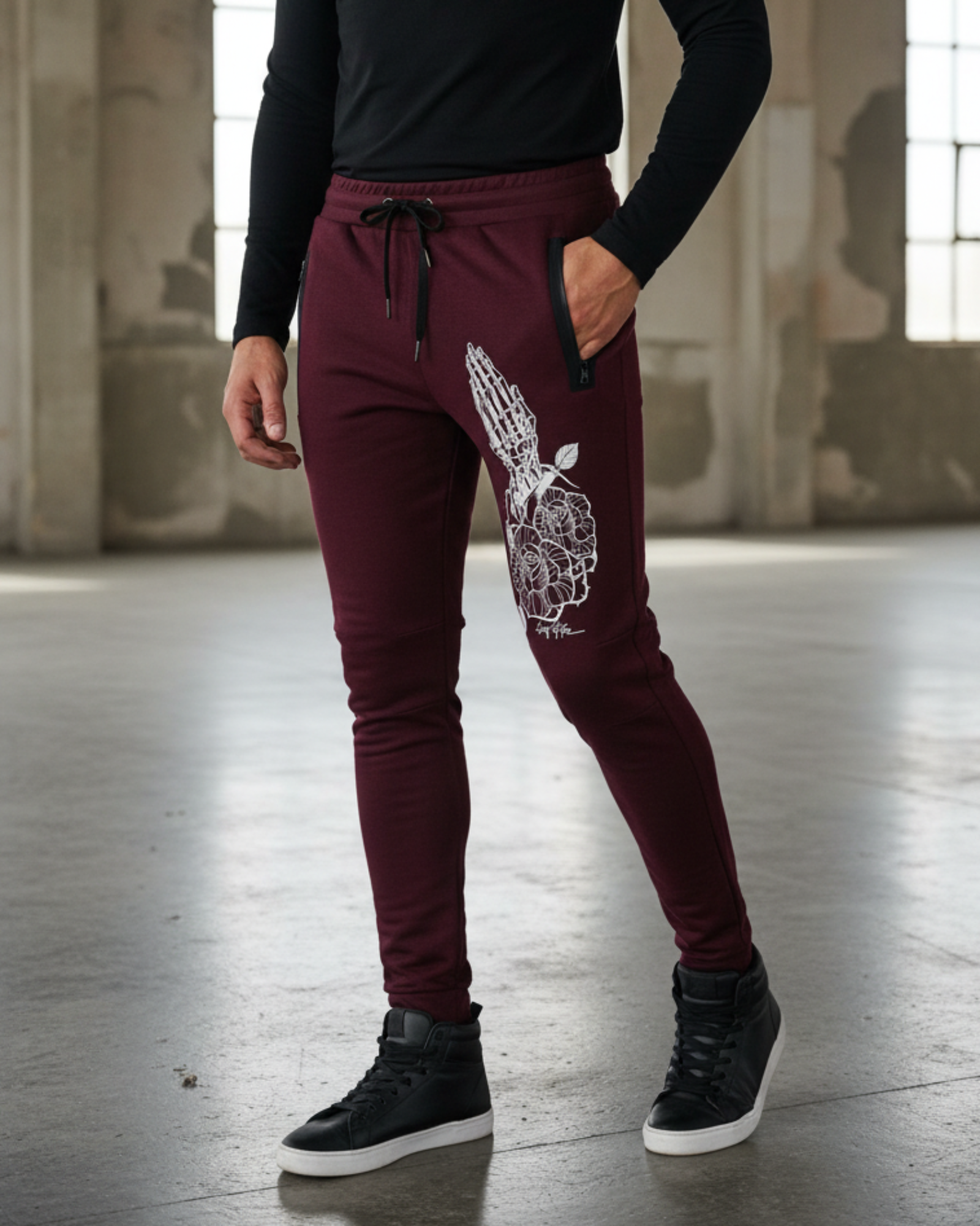 Men's burgundy printed knit joggers RYB1172 styled outfit side view with graphic print