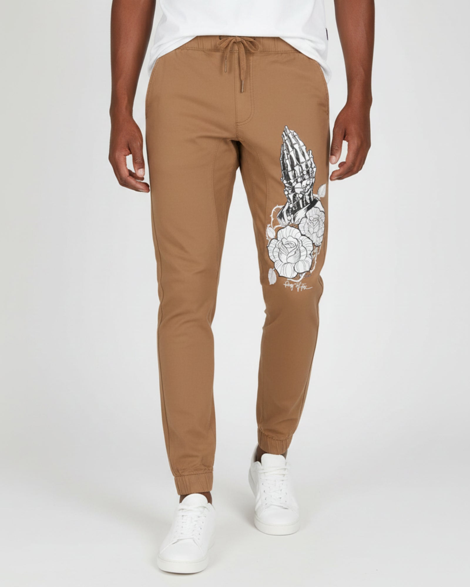 Men's dull gold printed knit joggers RYB1170 front view with graphic print on leg