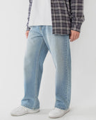Ring of Fire Arena Baggy Denim Jeans in Caspain wash angled view
