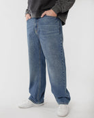 Ring of Fire Arena Baggy Denim Jeans in Sea Floor wash turn view