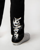 Savage Smiley Fleece Pants lower graphic detail view