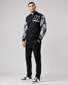 Ring of Fire Gibeon tapestry varsity jacket on model angled view