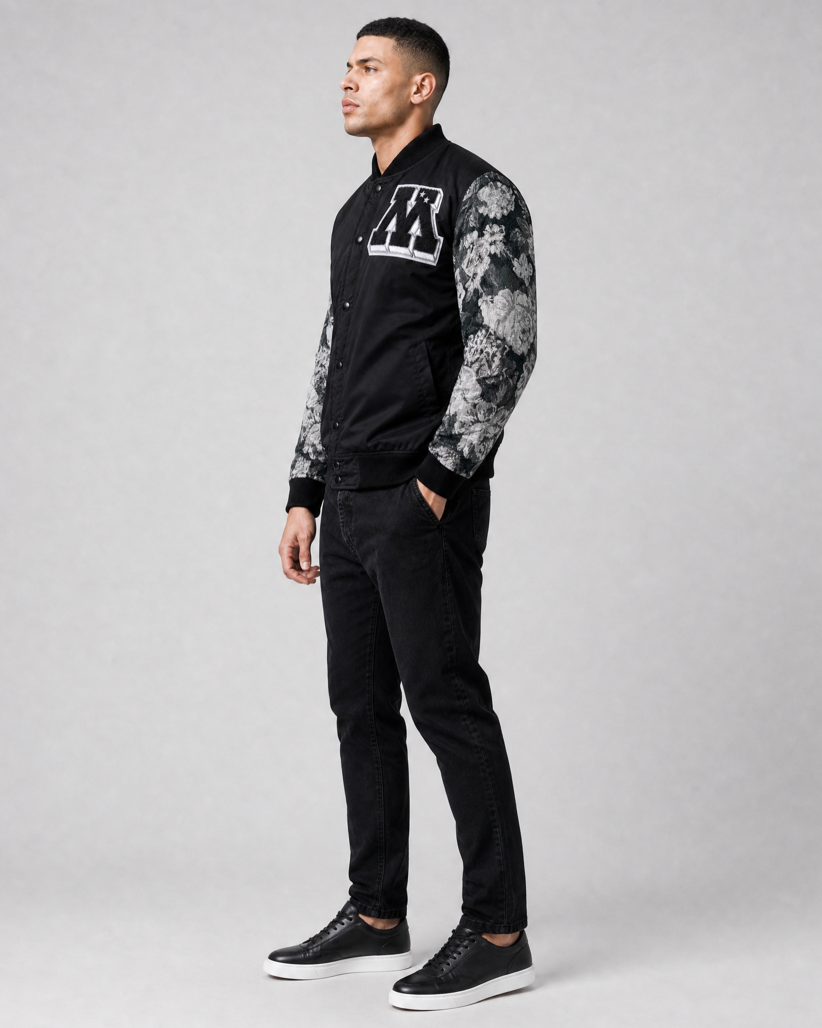Ring of Fire Gibeon tapestry varsity jacket on model side view