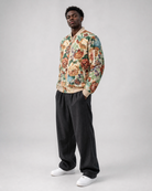 Ahikam tapestry bomber jacket angled front view featuring floral tapestry design