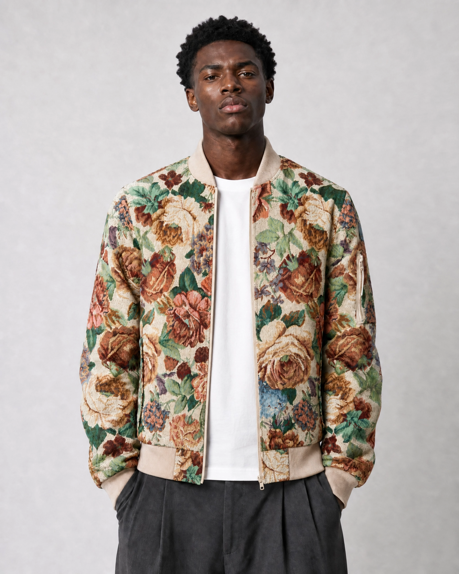 Ahikam tapestry bomber jacket front view with floral woven tapestry pattern