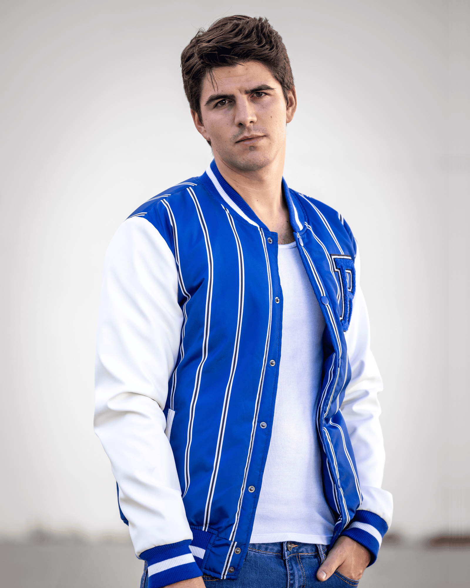 Model in blue striped jacket from our men's outerwear collection