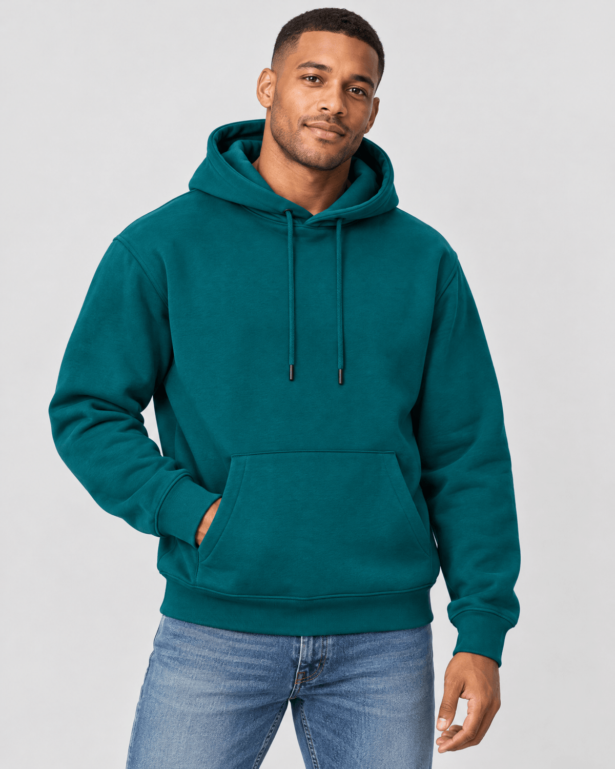 Men's Deep Teal Heavyweight Pullover Hoodie front 3/4 view with kangaroo pocket and premium heavyweight construction