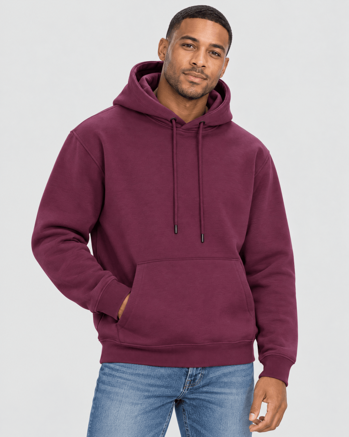 Men's Grape Wine Heavyweight Pullover Hoodie front 3/4 view with kangaroo pocket and premium heavyweight construction
