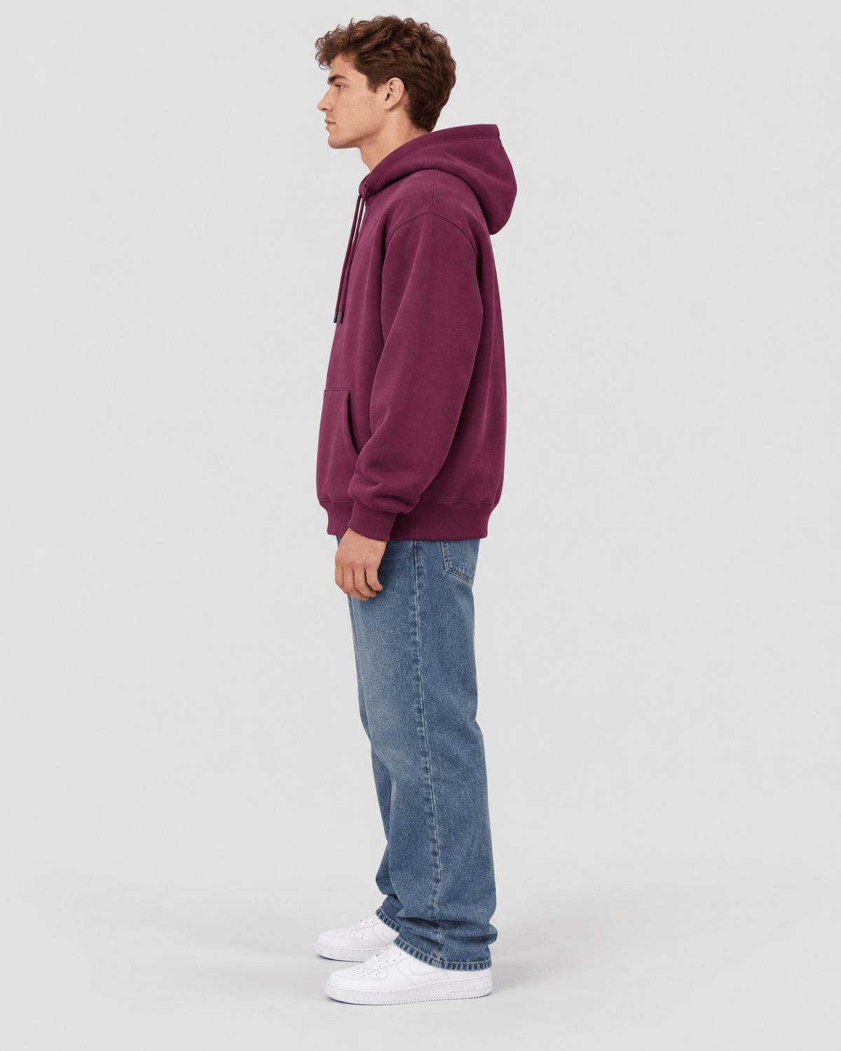 Men's Grape Wine Heavyweight Pullover Hoodie side profile view showing hood projection and overall fit