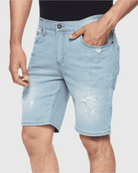 Angle shot of model in Smoke Blue Men’s Ripper Denim Shorts from Ring of Fire