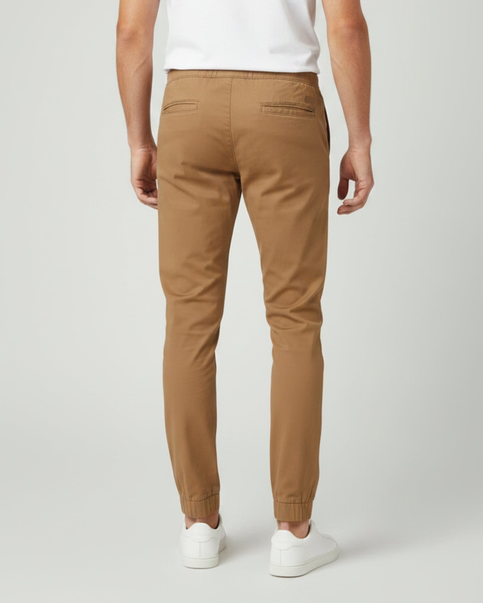 Men's dull gold printed knit joggers RYB1170 back view with tapered fit